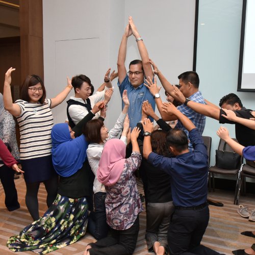 Enfiniti PLAY! participants in a team exercise